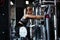 Young Female doing weight exercise for legs by Inner Thigh Machine in the sports gym.