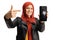 Young female with a hijab holding a smartphone with a broken screen and pointing