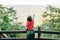 Young female nature explorer enjoying the view from viewpoint