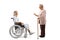 Young female patient in a wheelchair and an elderly woman having a conversation