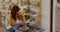 Young female potter working in her studio