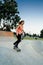 Young female skateboarder at the skatepark