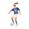 Young female soccer player kicking ball forward. Woman playing football in blue sports uniform, boots with studded sole