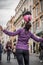 Young female street entertainer performing with her football in the streets of Rome