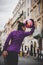 Young female street entertainer performing with her football in the streets of Rome