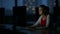 Young female student in a computer classroom