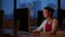 Young female student in a computer classroom