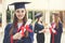 Young female students graduating from university