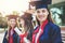 Young female students graduating from university