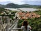 A young female tourist admiring the views of the historic medieval town of Ston, Croatia.