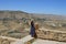 Young female tourist enjoying the beautiful view of ancient Kerak in Jordan