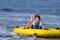 Young Female Tuber Holding on With Eyes Closed