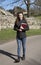 Young female vicar walking in her parish