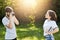 Young female wearing T-shirt and jeans posing in camera to photographer. Young talented male with retro camera photographing prett