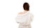 young female in white bathrobe, back view