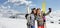 Young females with ski equipment taking a selfie on the mountain