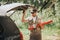 Young fisherman fishing on lake or river. Guy hold car`s trunk opened and going to close it before fishing. Preparing