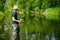 Young Fisherman Fishing with Patience