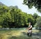 A young fisherman fishing on a river