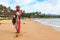 Young fisherman with his catch on Nacpan beach, Palawan