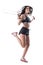 Young fit active brunette latin woman doing jumping or skipping rope exercises.