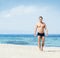 Young and fit man on the beach