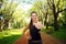 Young fit sportive woman shows hands with thumbs up happily