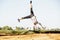 Young fit woman doing simple acrobatics exercise