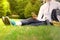 Young fitness woman with mobile phone having a rest