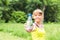 Young fitness woman with water bottle. Focus on the bottle