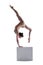 Young flexible woman posing on cube