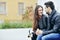 Young flirting couple in love outdoor