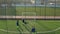 Young football players during training match