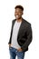 Young friendly and happy afro american man smiling excited and posing cool and cheerful isolated