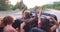 Young friends enjoying their road trip in convertible car