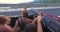 Young friends enjoying their road trip in convertible car