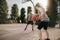 Young friends playing basketball on court