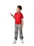 Young full body boy kid in red polo t-shirt standing pointing one finger at the corner isolated on white