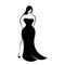 A young full-figured woman in an elegant long form-fitting black evening dress