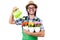 Young funny gardener with tulips and watering can