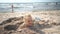 Young funny girl is buried in beach sand. Blurred people and sea on background