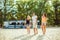 Young funny guys in sunglasses on the beach. Friends together.