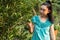 Young gardener Asia woman smiling and picking Thai honey tangerine oranges in the garden