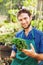 Young gardener with bonsai