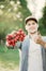 Young gardener holding fresh harvest radish