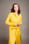Young ginger woman in yellow shirt dress. Female bright look  lemon casual style.