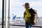 Young girl in airport ready for new adventures