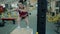 Young girl athletic builds her leg muscles, performing jumps on the curb
