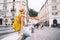 Young girl with backpack in  Ljubljana Old Town. Travel Slovenia