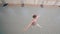 young girl ballerina trains in the dance hall